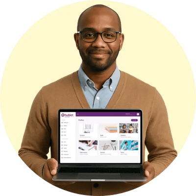 Librarian holds laptop using Hublet Manager