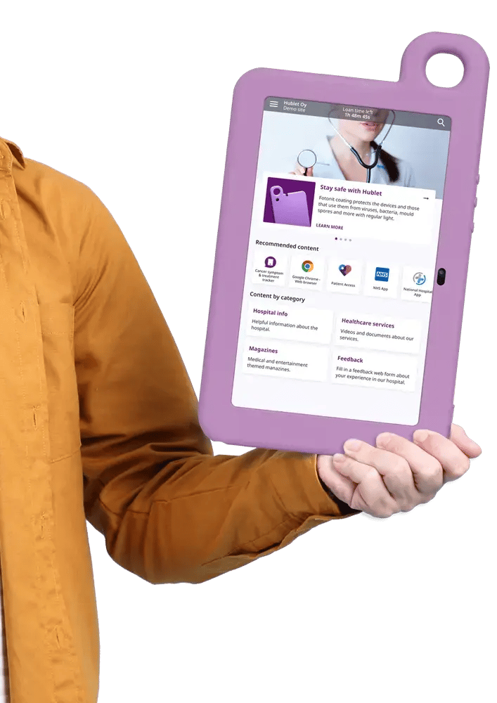Man hold shared tablets with healthcare profile - Hublet One